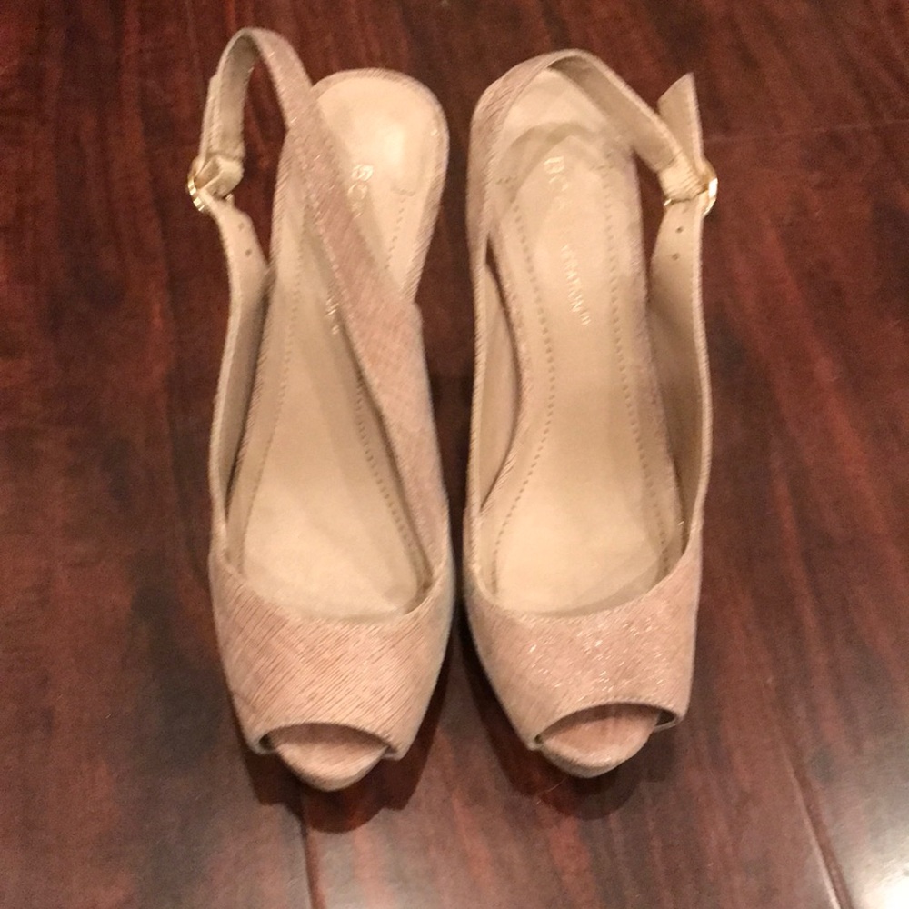 In great condition; platform slingback with an elegant of shimmer beige texture